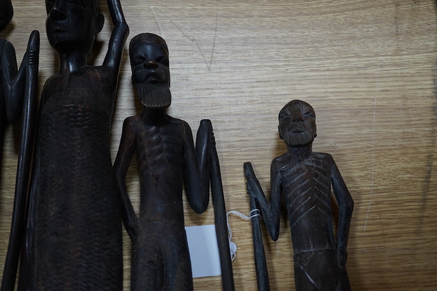 Six African tribal carved wood figures, tallest 48cm high. Condition - good